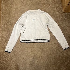 Used white nike air shirt.